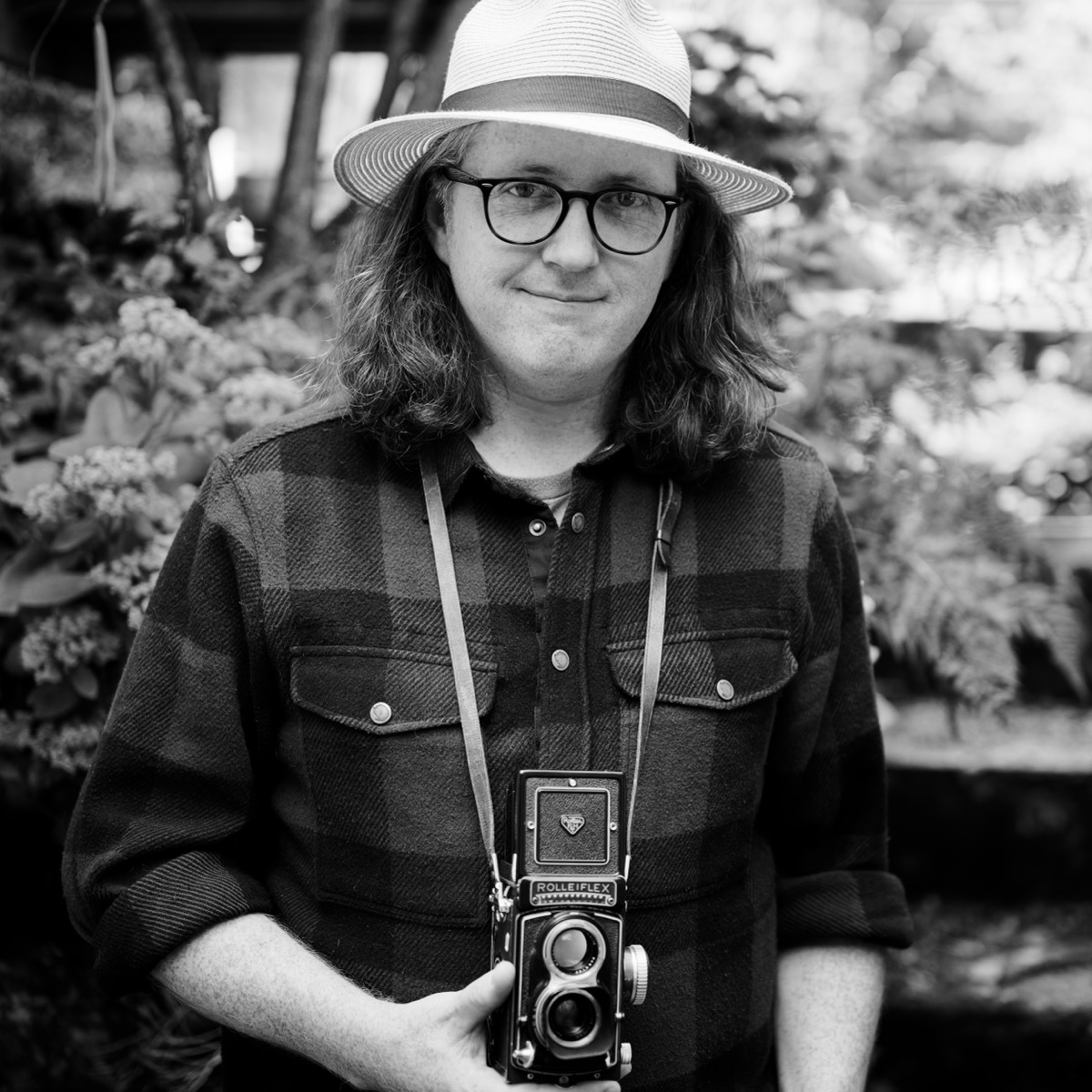 Robert May with a Rolleiflex medium format camera