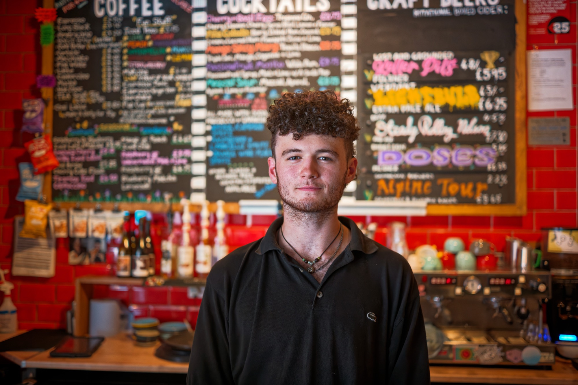 Barman at craft beer bar