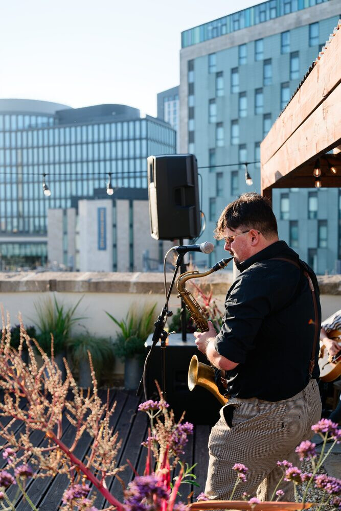 A saxophonist on the roof in Cardiff